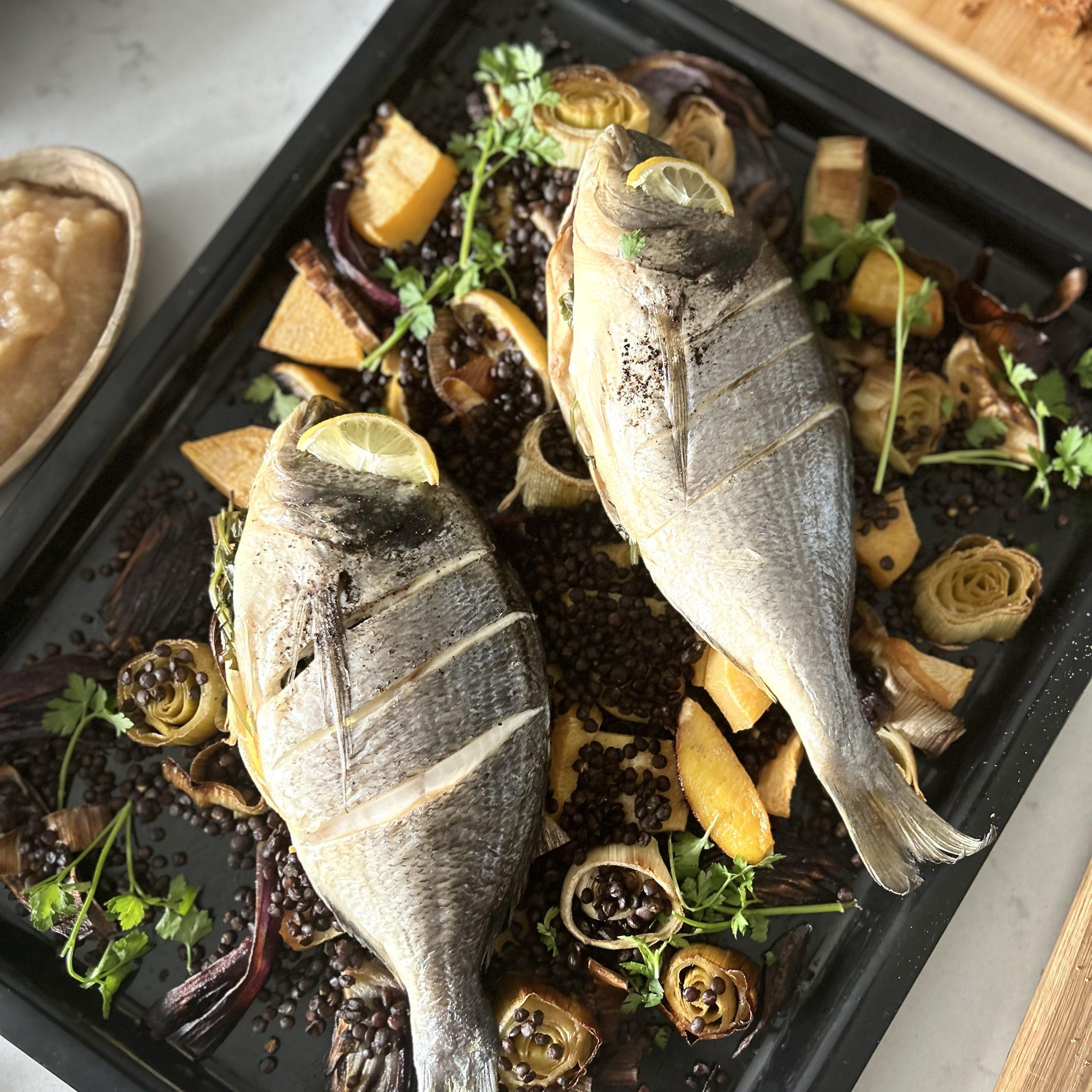whole baked sea bream with roasted vegetables and puy lentils